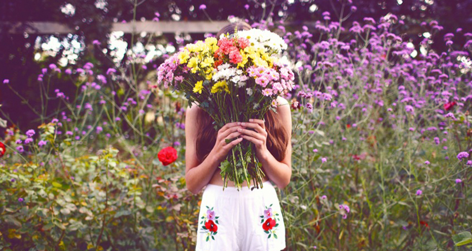 Thoughts of Girl Holding Flowers In Field