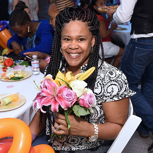 Woman Holding Flower Bouquet