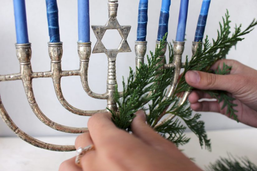 Weave greenery through your menorah