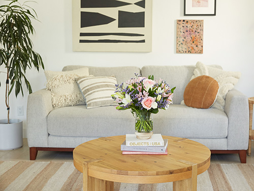 Spring flower bouquet on living room table.