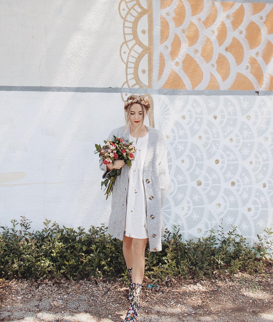 Chic Woman Holding Flowers Chic Woman Holding Flowers