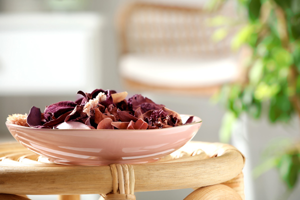 flower potpourri in a dish on table in room