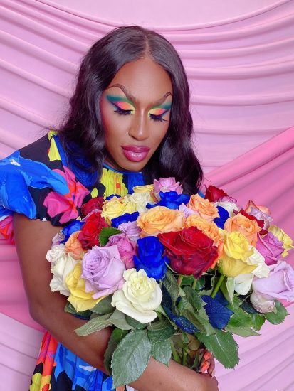 Shea Coulee with Rainbow Pride bouquet