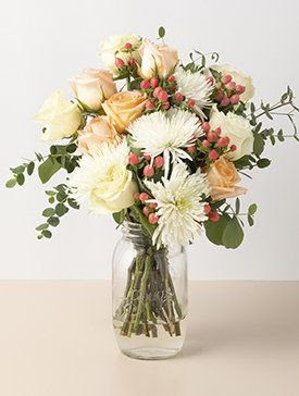 mixed flowers in a mason jar vase, subscription exclusive bouquet