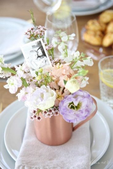 teacup with flowers and a photograph