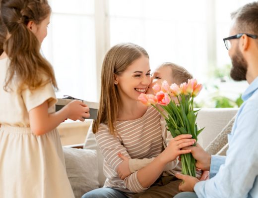 A family surprises mom on Mother's Day with flowers.