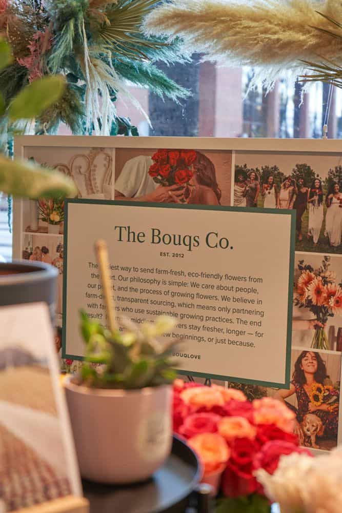 Floral display with company pictureboard