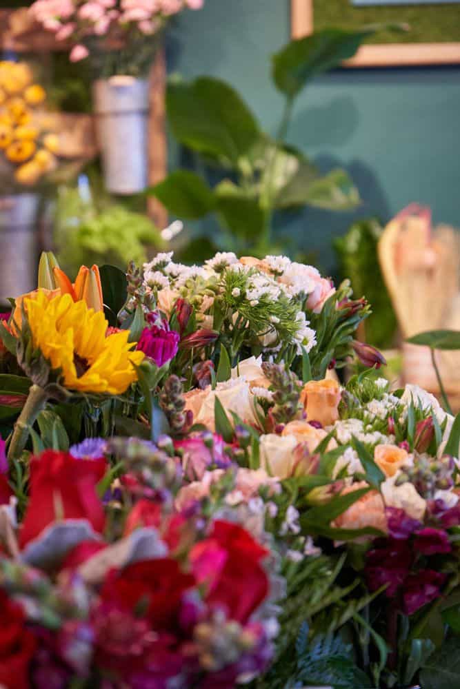 Floral display with company pictureboard
