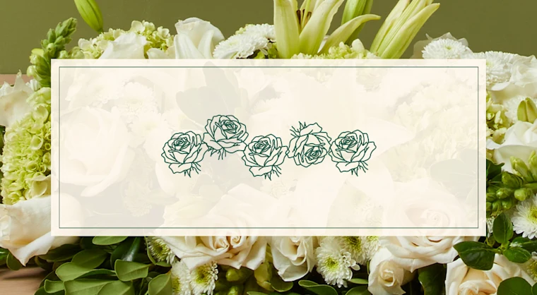 A background image of colorful flowers with the headline "The Garland" overlaid on top with an illustration of flowers in the shape of a garland.