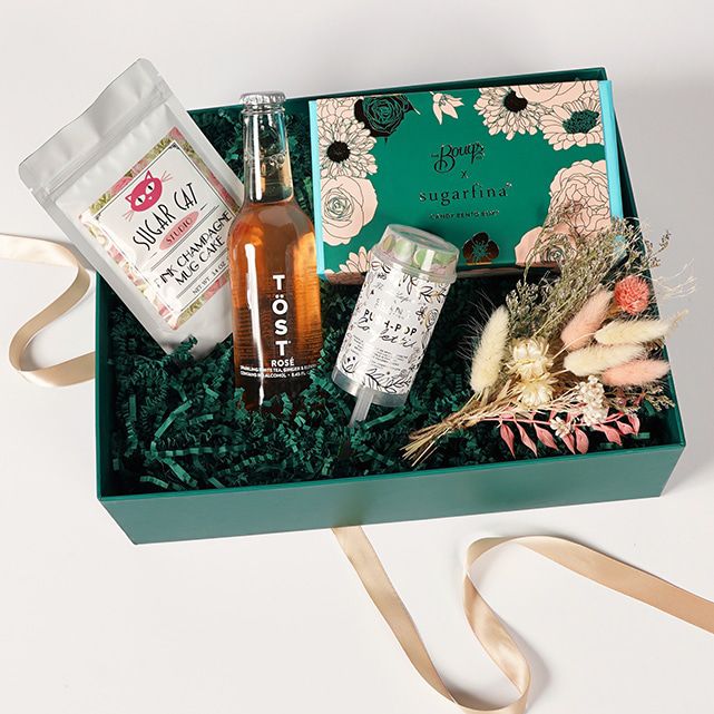 Bouqs gift box with various goods.