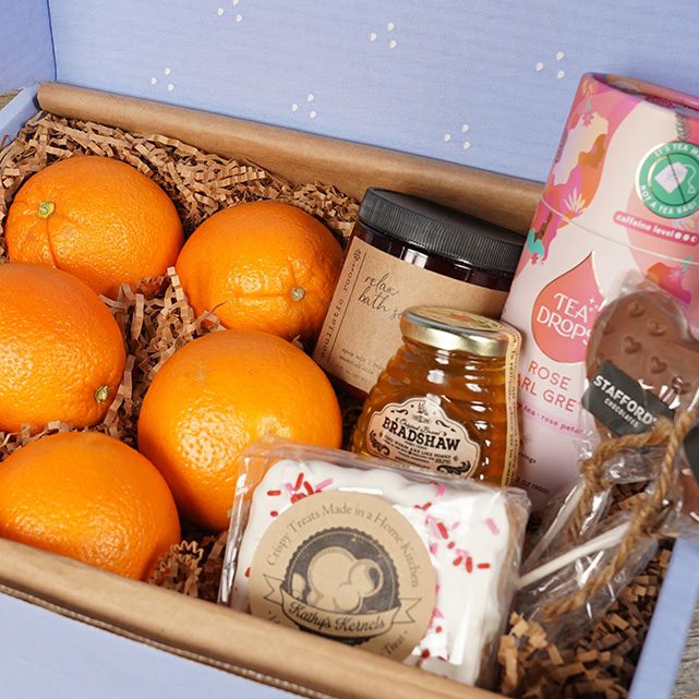 A gift box with various goods.