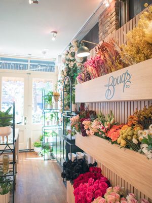 racks of fresh and dried flowers available for sale