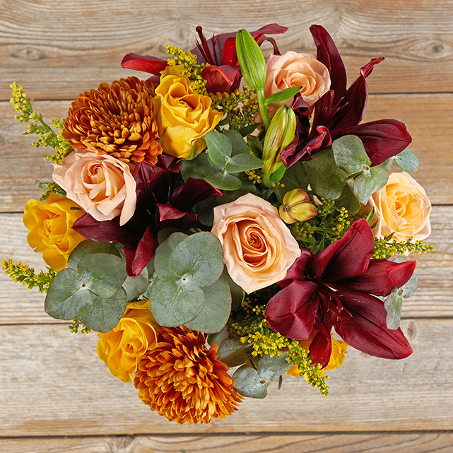 floral mix of roses, solidago and aster