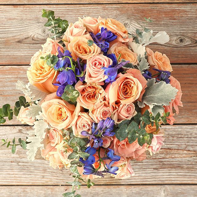 Blue Delphinium + Peach Roses - The Bouqs Co.
