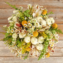 Yellow and white arrangement that features button chrysanthemums and sword ferns.