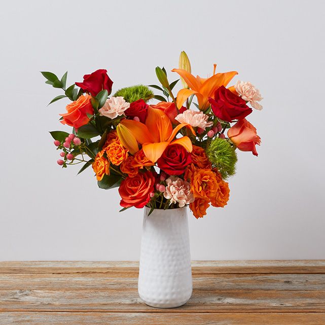 Orange Asiatic Lily + Orange & Red Roses + Peach Carnations - The Bouqs Co.