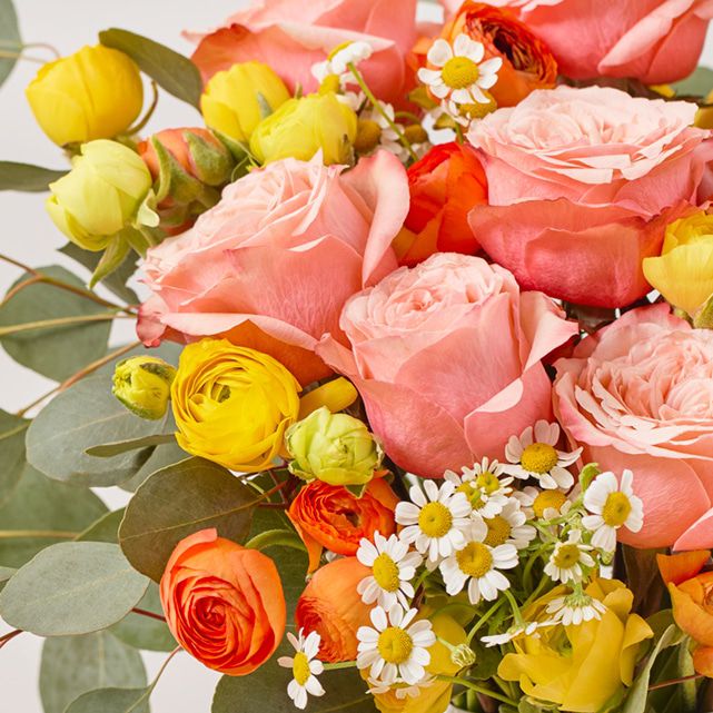 Orange & Yellow Ranunculus with Roses - The Bouqs Co.
