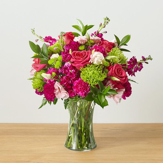 Vased arrangement of pink and green mixed flowers