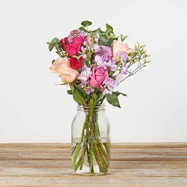 Pink, Lavender, and Light Pink Roses and Scabiosa. - The Bouqs Co.