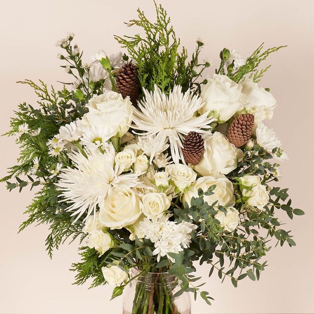 White Roses, Mums and Aster with Pinecones - The Bouqs Co. White Roses, Mums and Aster with Pinecones - The Bouqs Co.